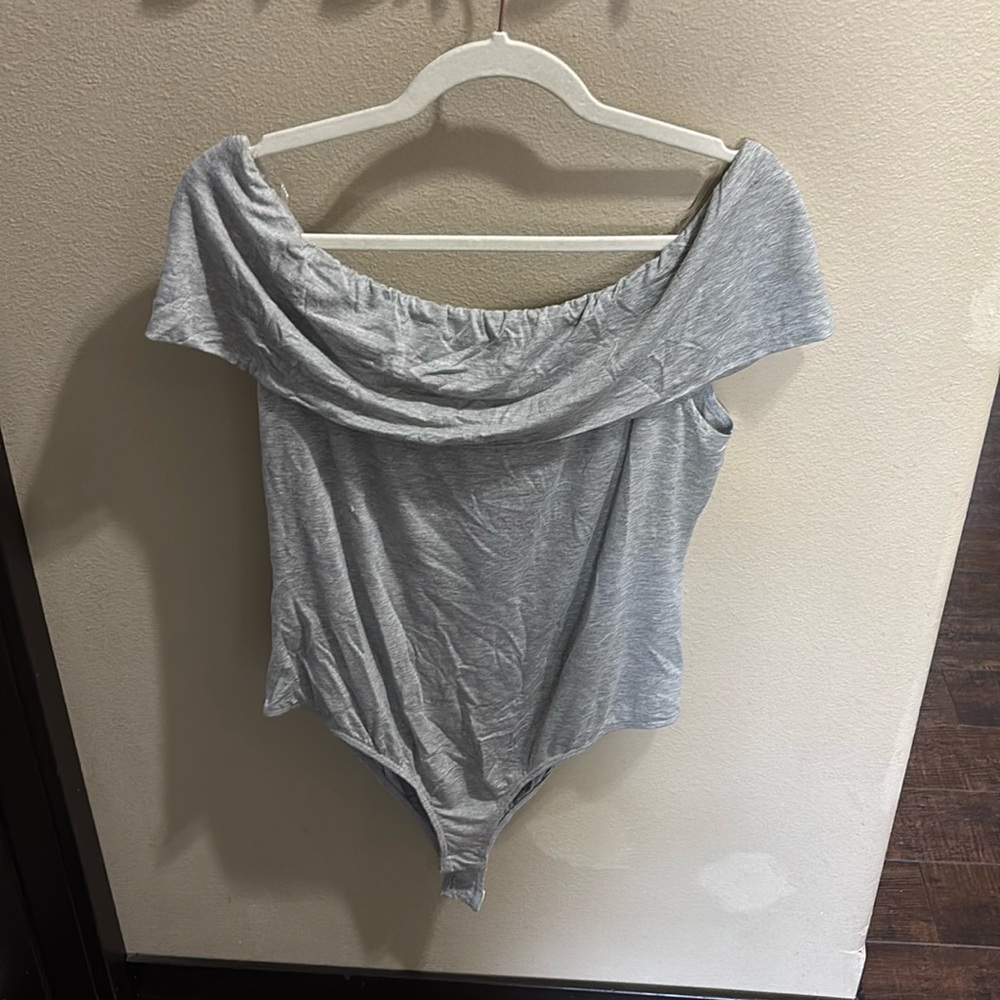 Brand new. Off the shoulder body suit shirt